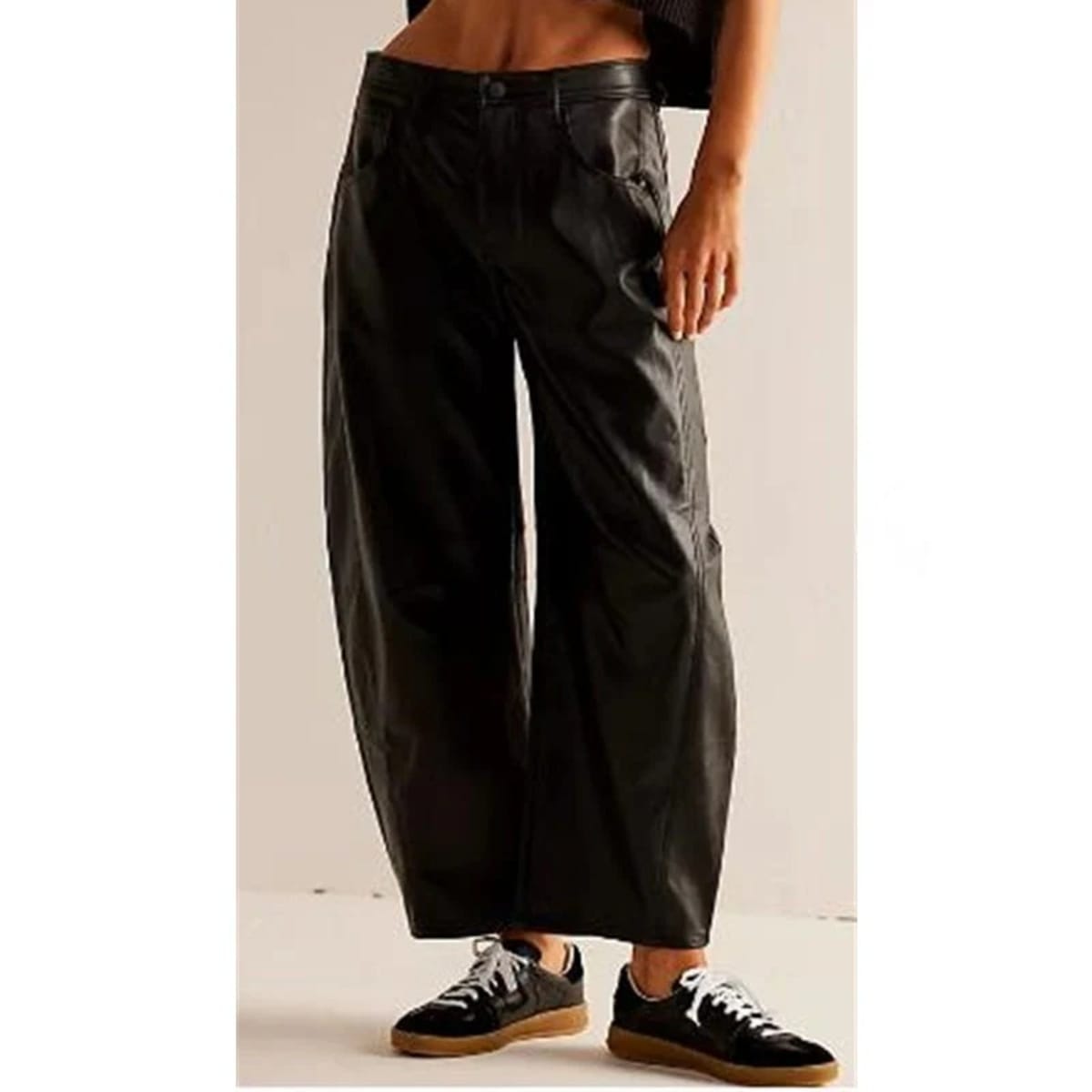 High-waisted barrel-leg jeans with seam detail.