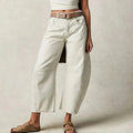 High-waisted barrel-leg jeans with seam detail.