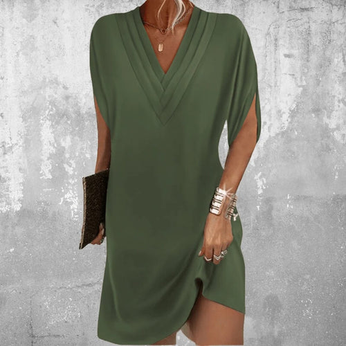 Dress with V-neckline and cutout sleeves, draped fit.