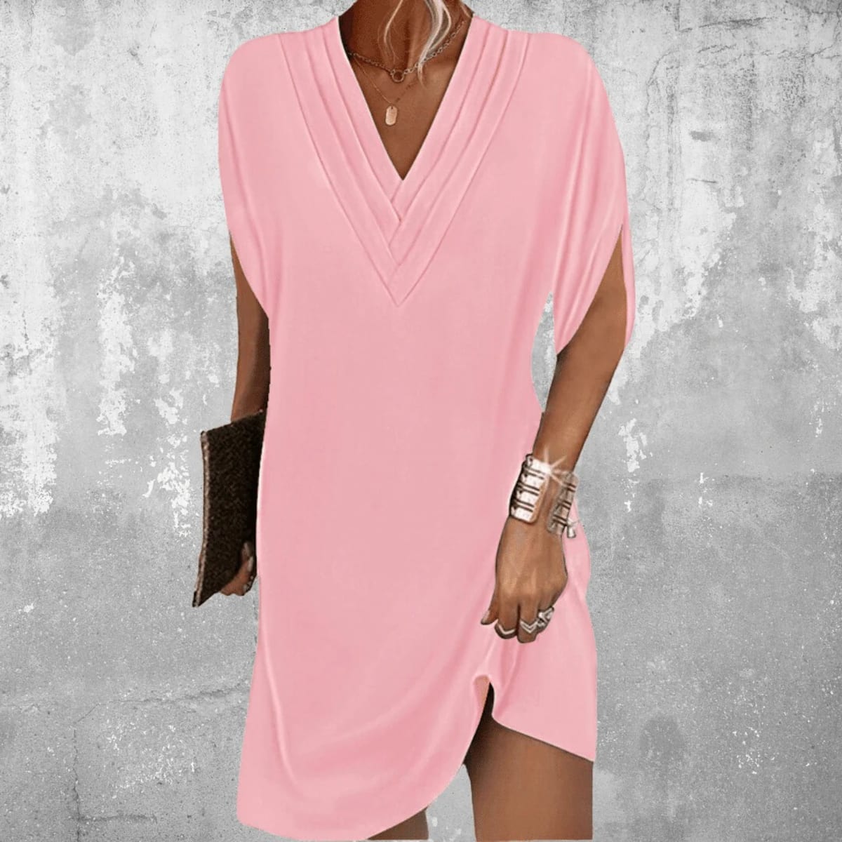 Dress with V-neckline and cutout sleeves, draped fit.