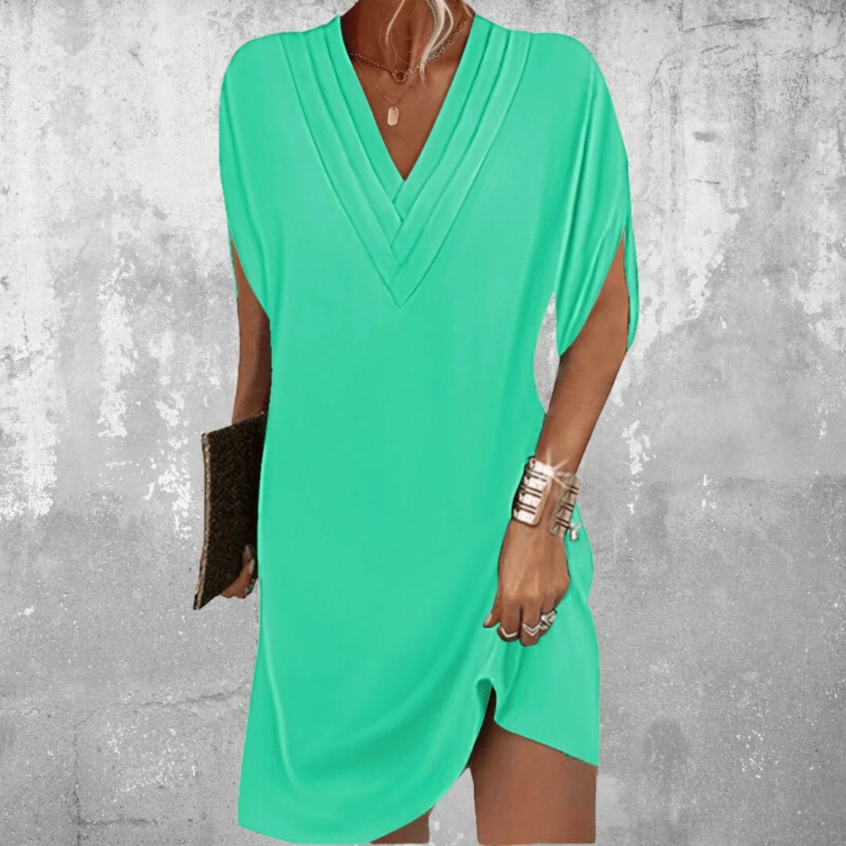 Dress with V-neckline and cutout sleeves, draped fit.