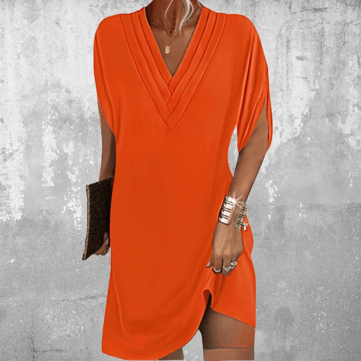 Dress with V-neckline and cutout sleeves, draped fit.