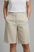 High-waisted shorts with elastic waistband and side pockets.