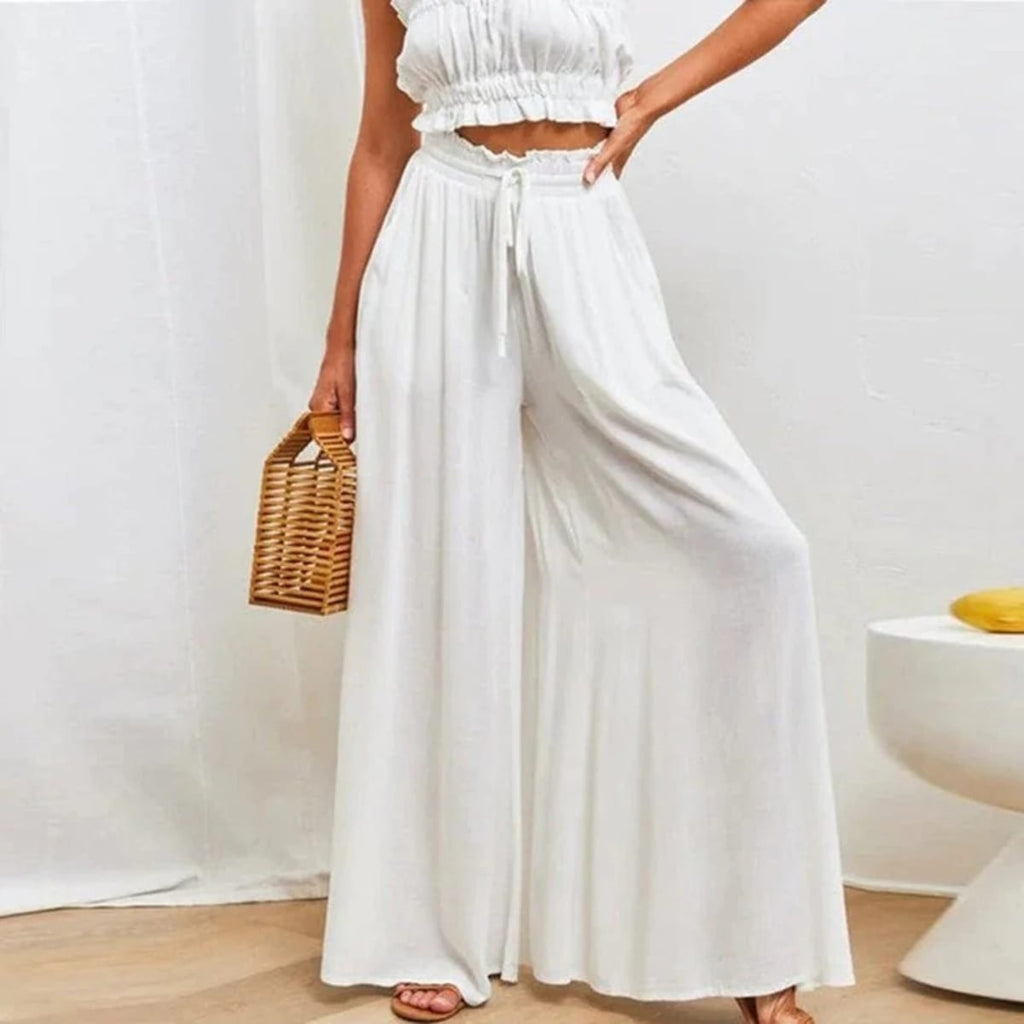 High-waisted wide-leg palazzo pants with drawstring waist.