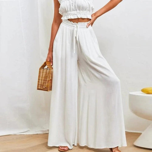 High-waisted wide-leg palazzo pants with drawstring waist.
