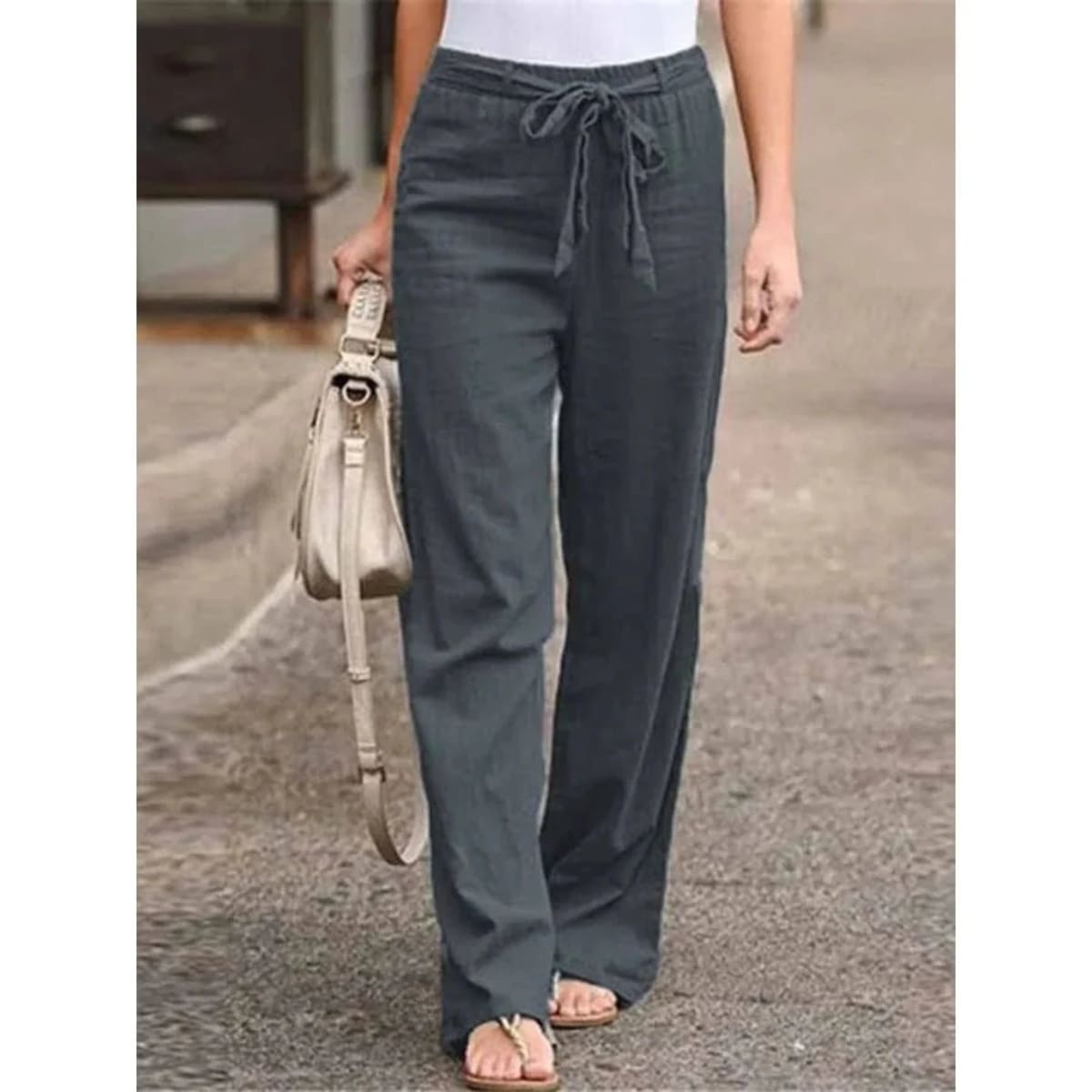 Women's wide-leg pants with drawstring waist, relaxed fit.