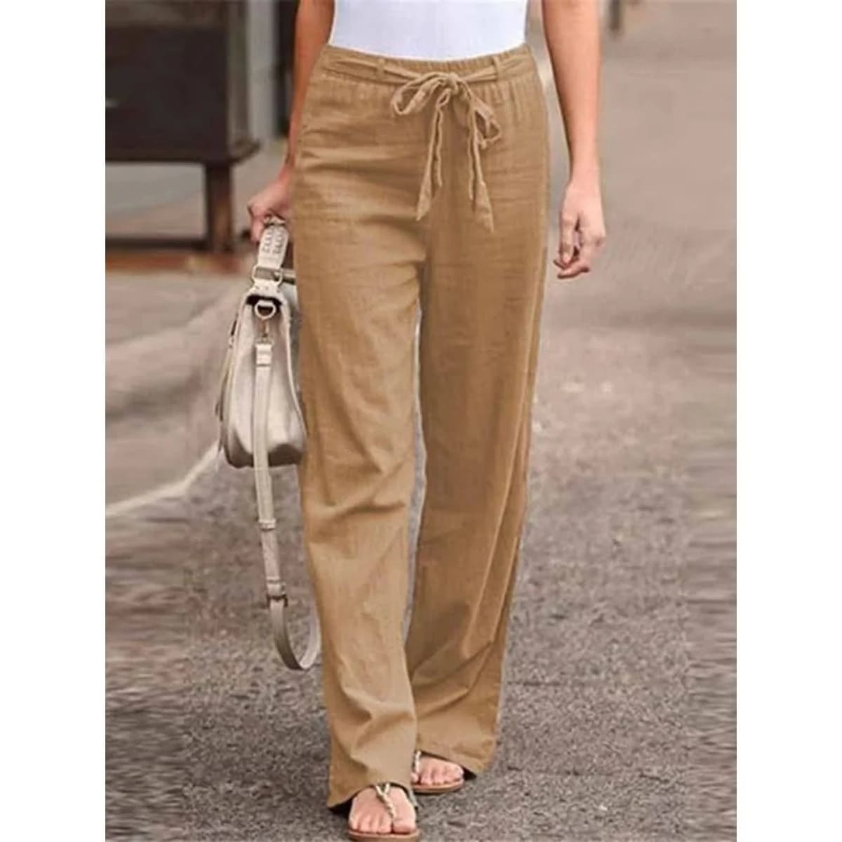 Women's wide-leg pants with drawstring waist, relaxed fit.