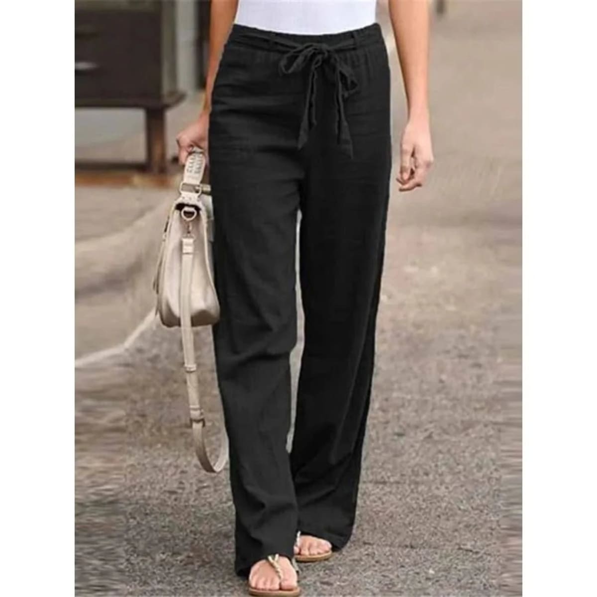 Women's wide-leg pants with drawstring waist, relaxed fit.