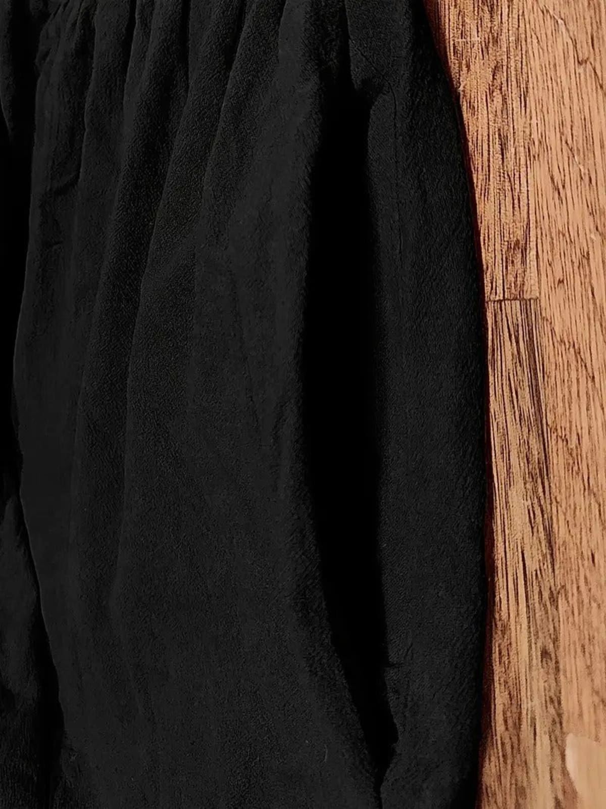 Lightweight dress with flowing silhouette and refined neckline.