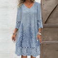 Midi dress with embroidery, structured fit, and breathable fabric.