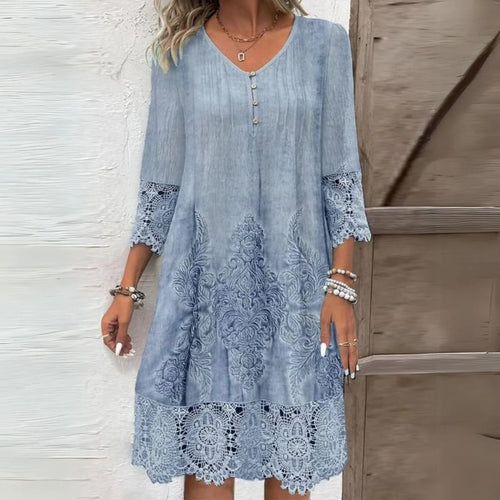 Midi dress with embroidery, structured fit, and breathable fabric.