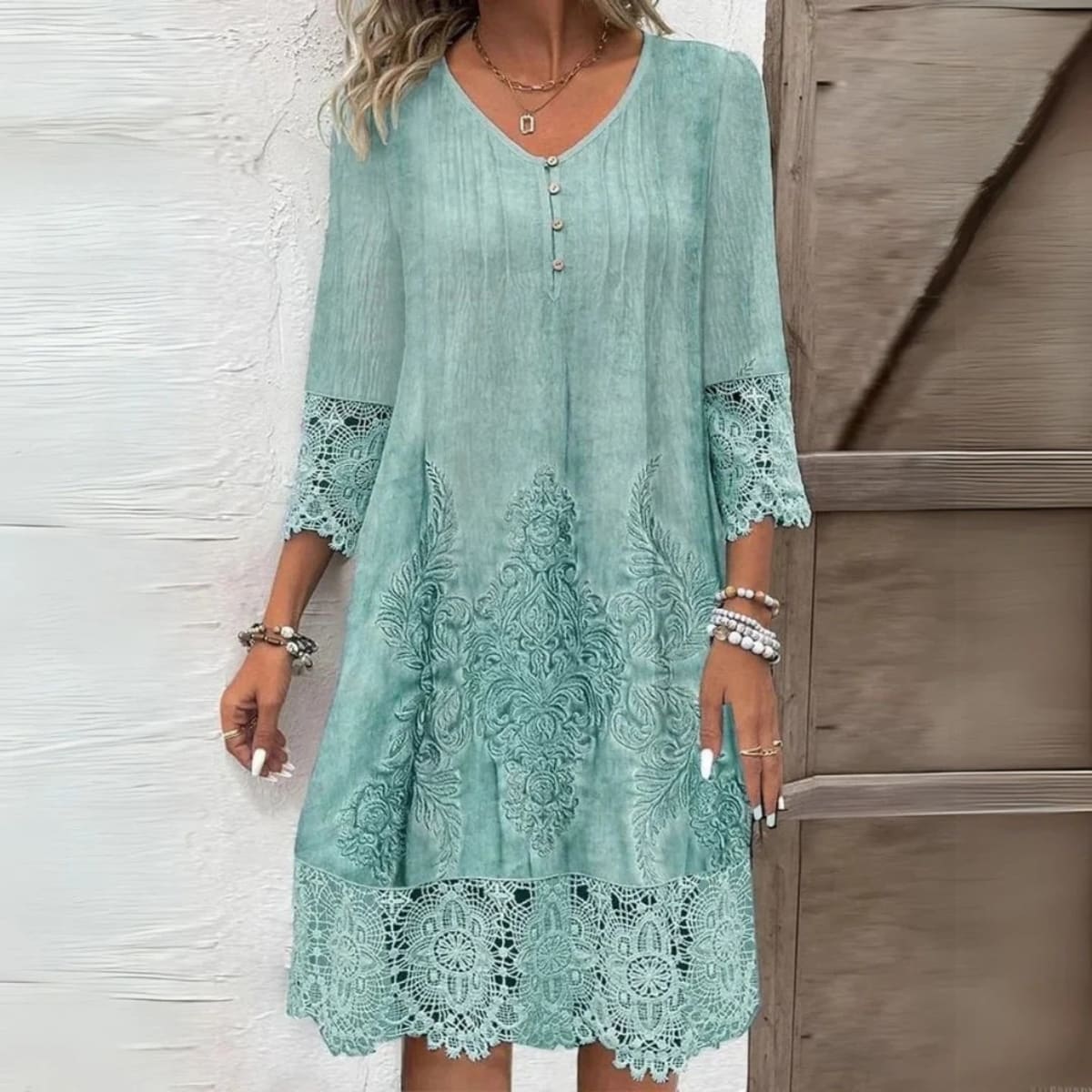 Midi dress with embroidery, structured fit, and breathable fabric.