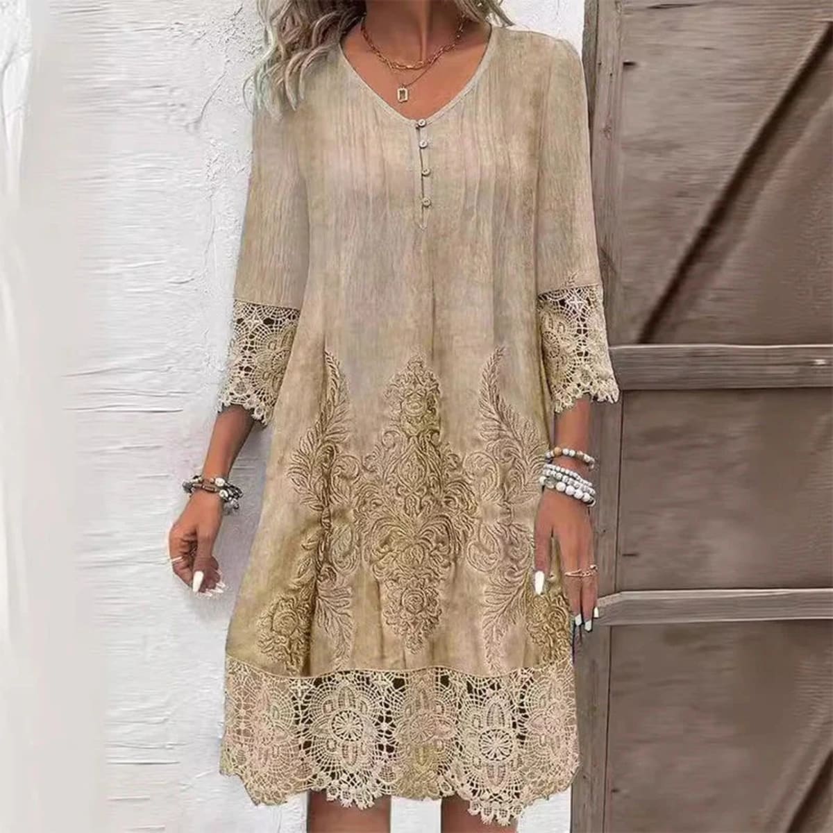 Midi dress with embroidery, structured fit, and breathable fabric.