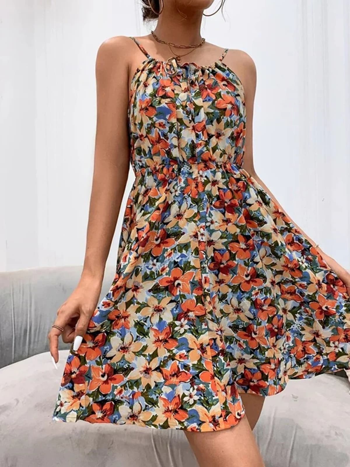 Floral A-line halter dress with lace-up detail and lightweight fabric