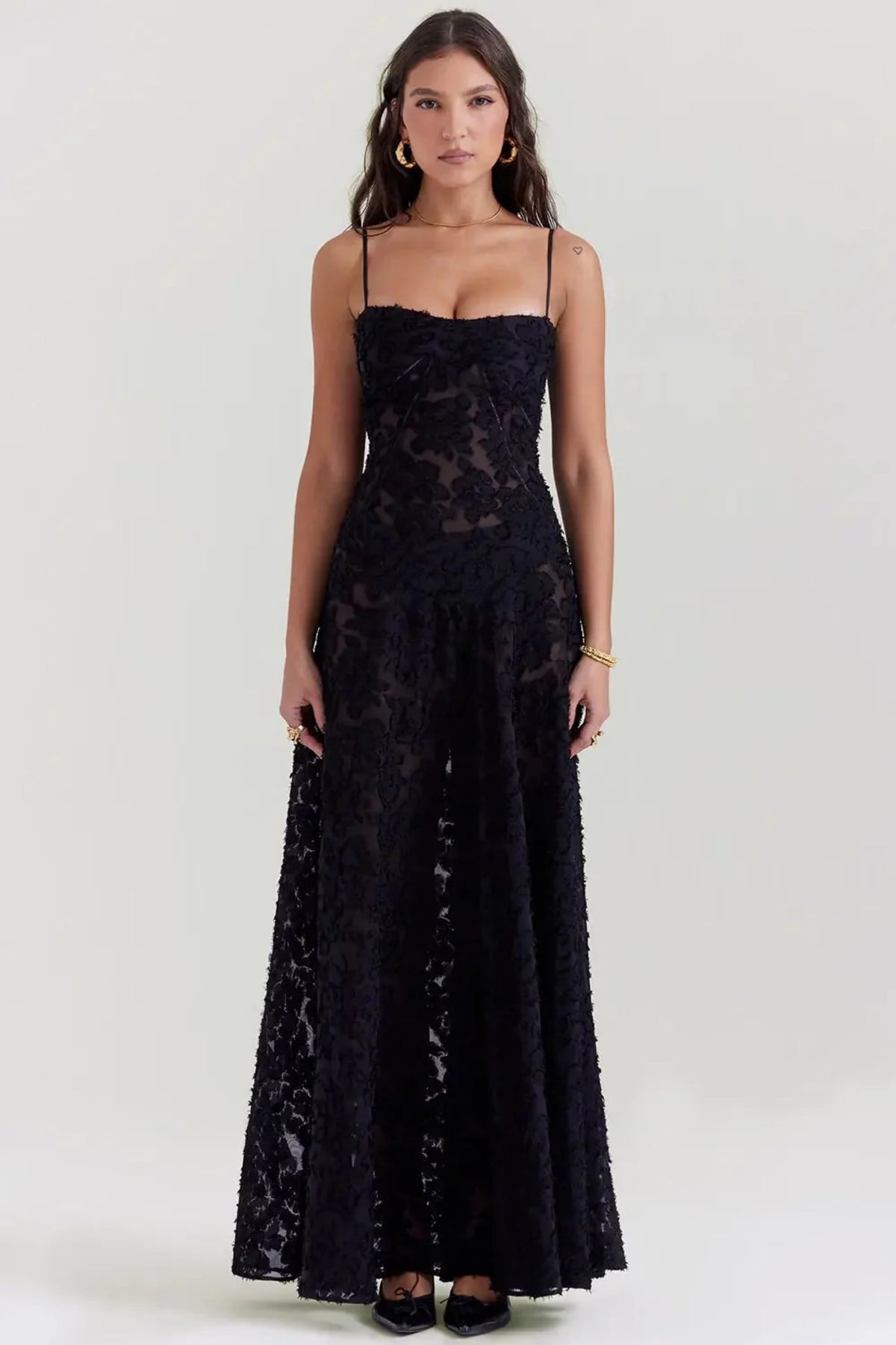 Long summer dress with open back and adjustable straps.