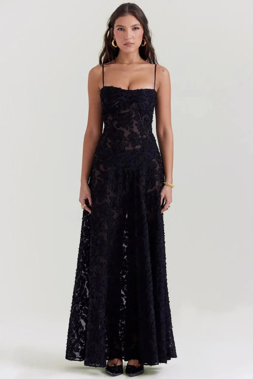 Long summer dress with open back and adjustable straps.