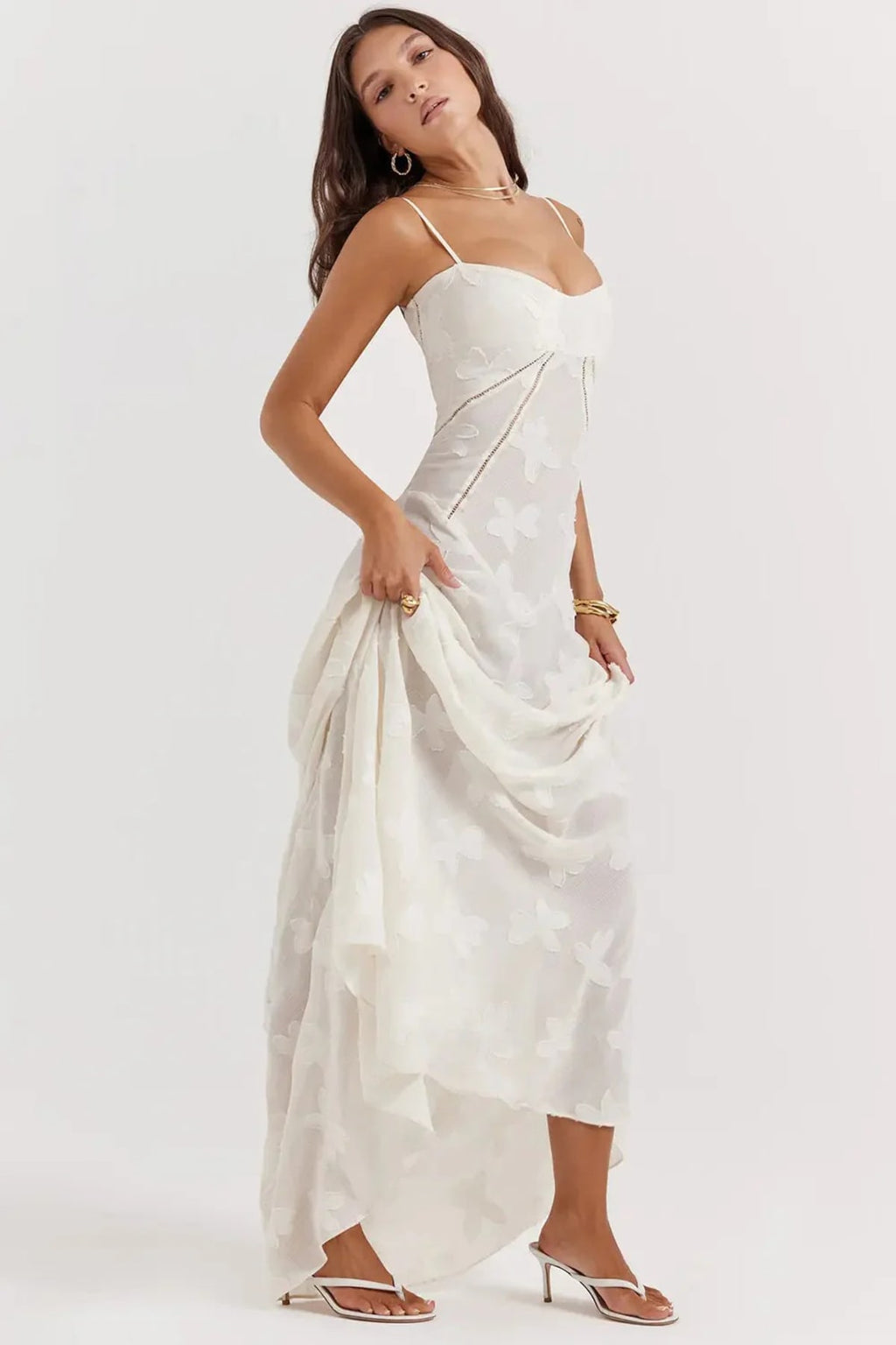 Long summer dress with open back and adjustable straps.