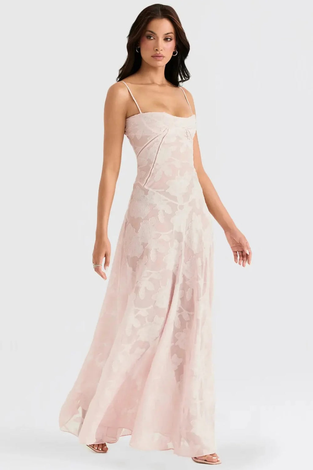 Long summer dress with open back and adjustable straps.
