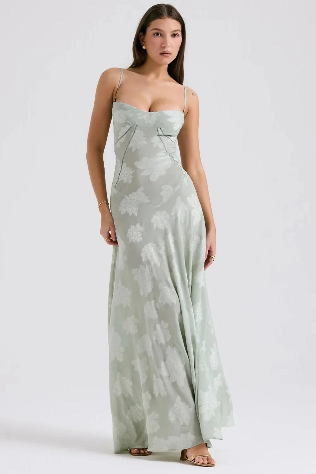 Long summer dress with open back and adjustable straps.