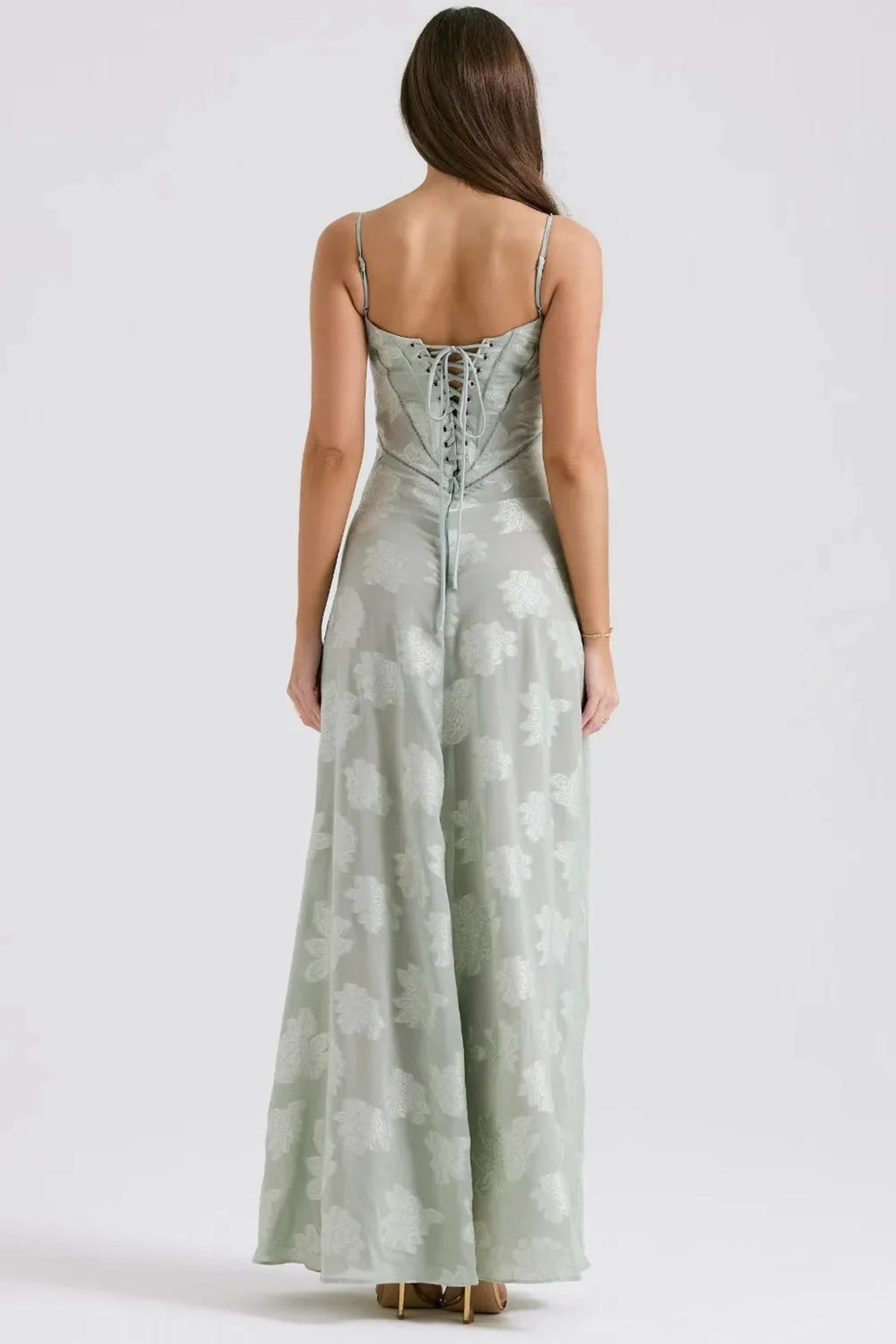 Long summer dress with open back and adjustable straps.