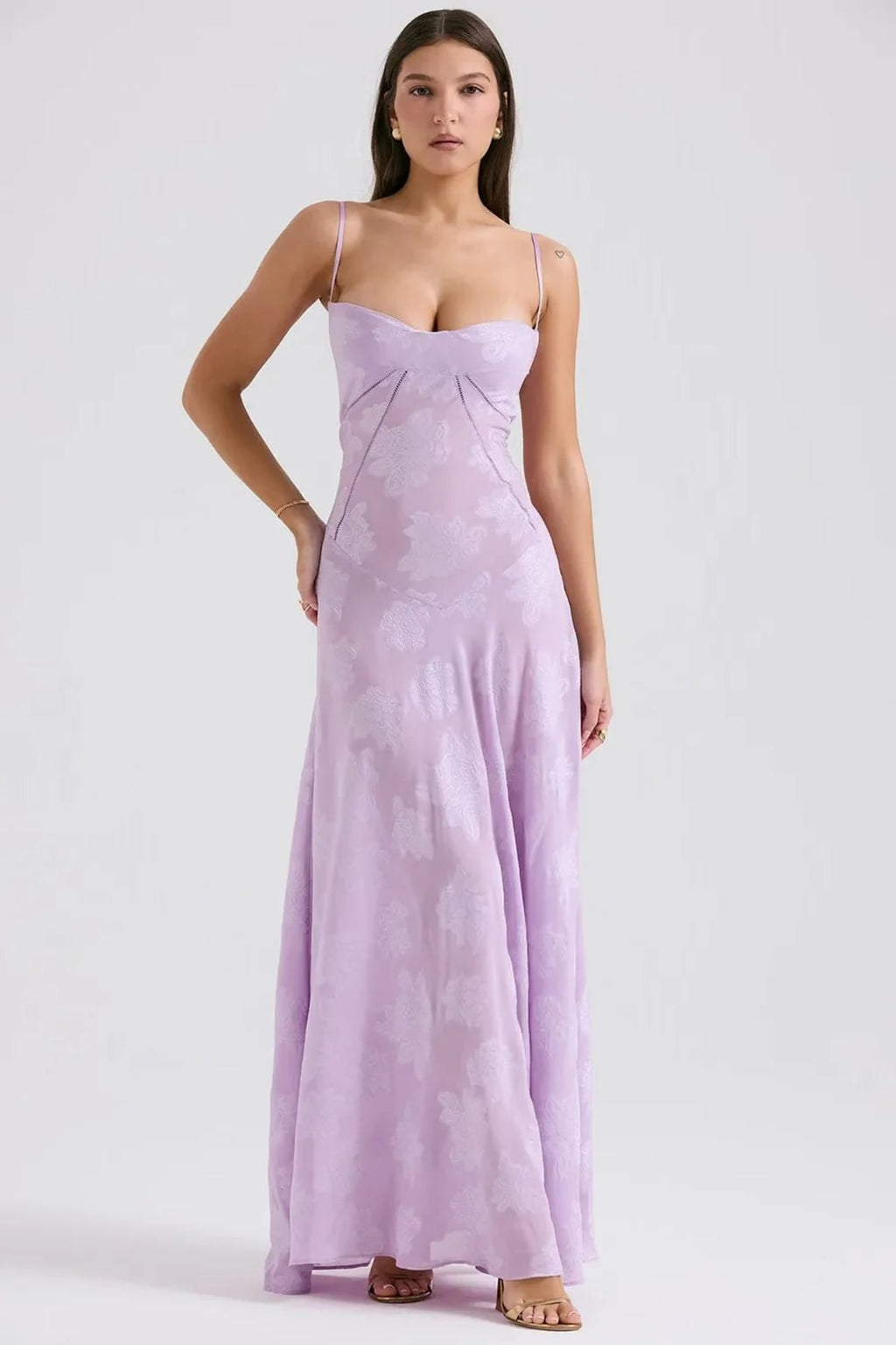 Long summer dress with open back and adjustable straps.