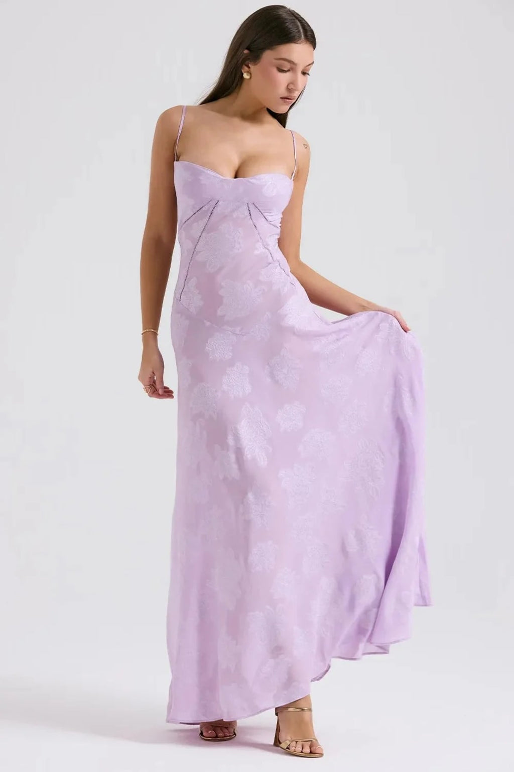 Long summer dress with open back and adjustable straps.