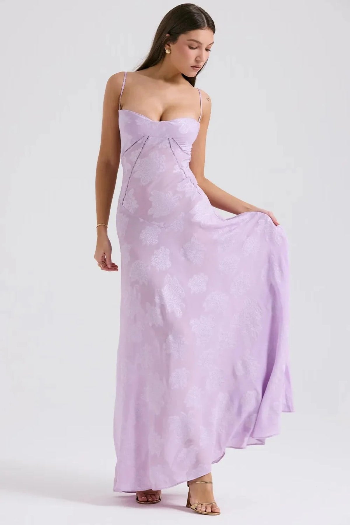 Long summer dress with open back and adjustable straps.