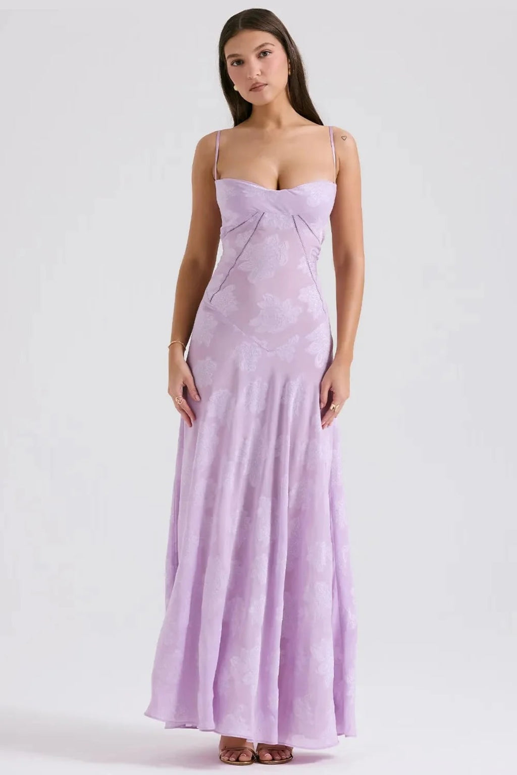 Long summer dress with open back and adjustable straps.
