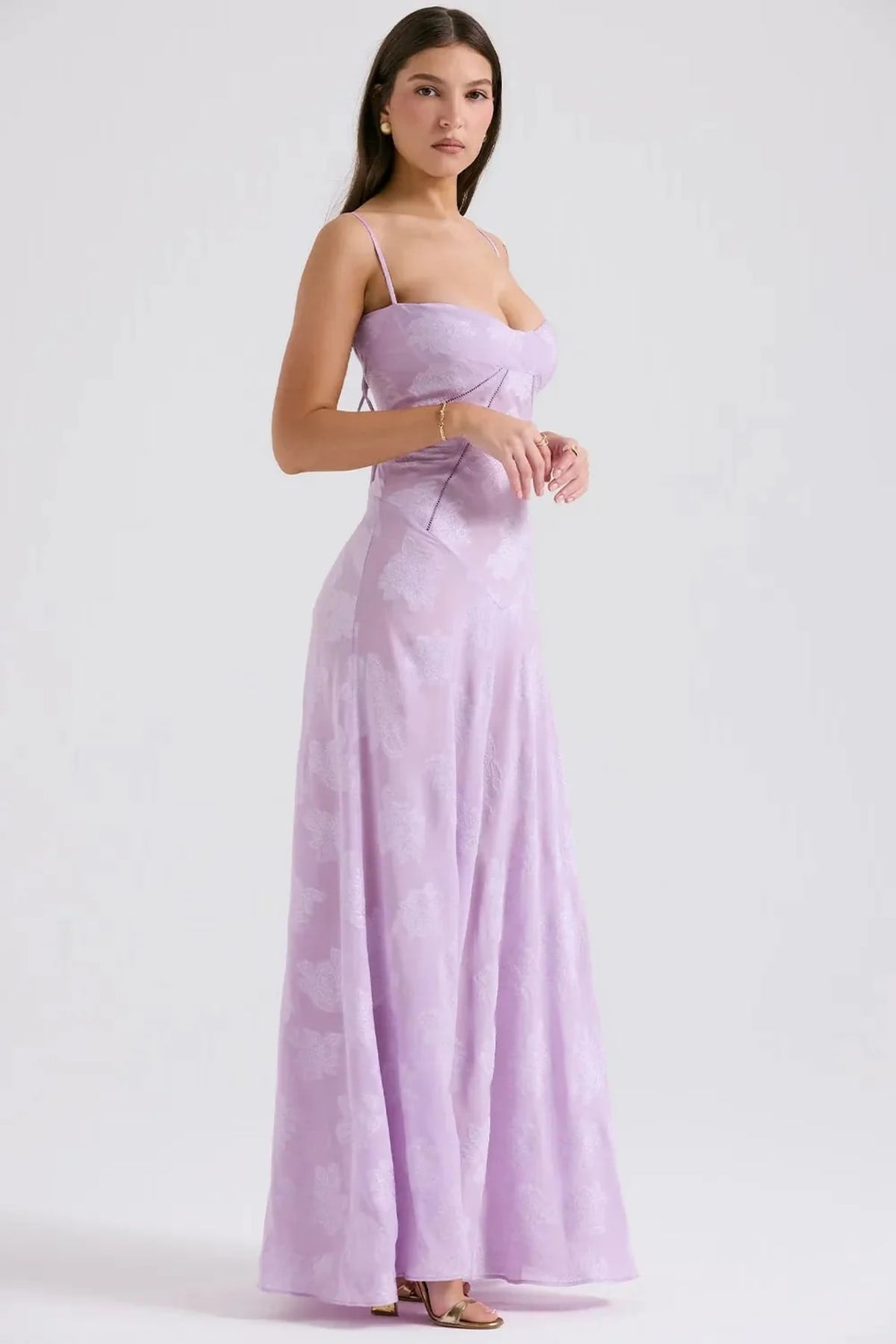 Long summer dress with open back and adjustable straps.