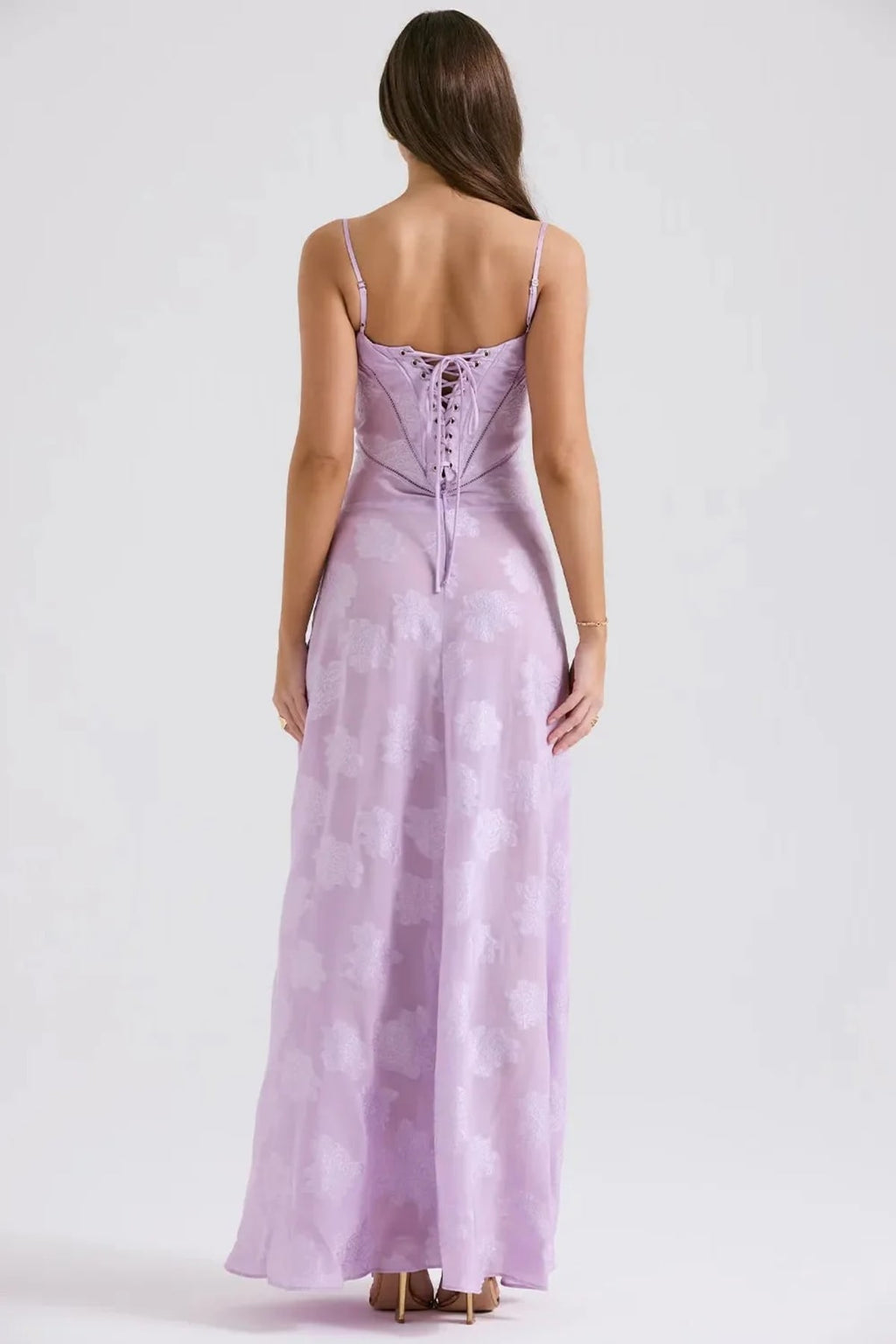 Long summer dress with open back and adjustable straps.