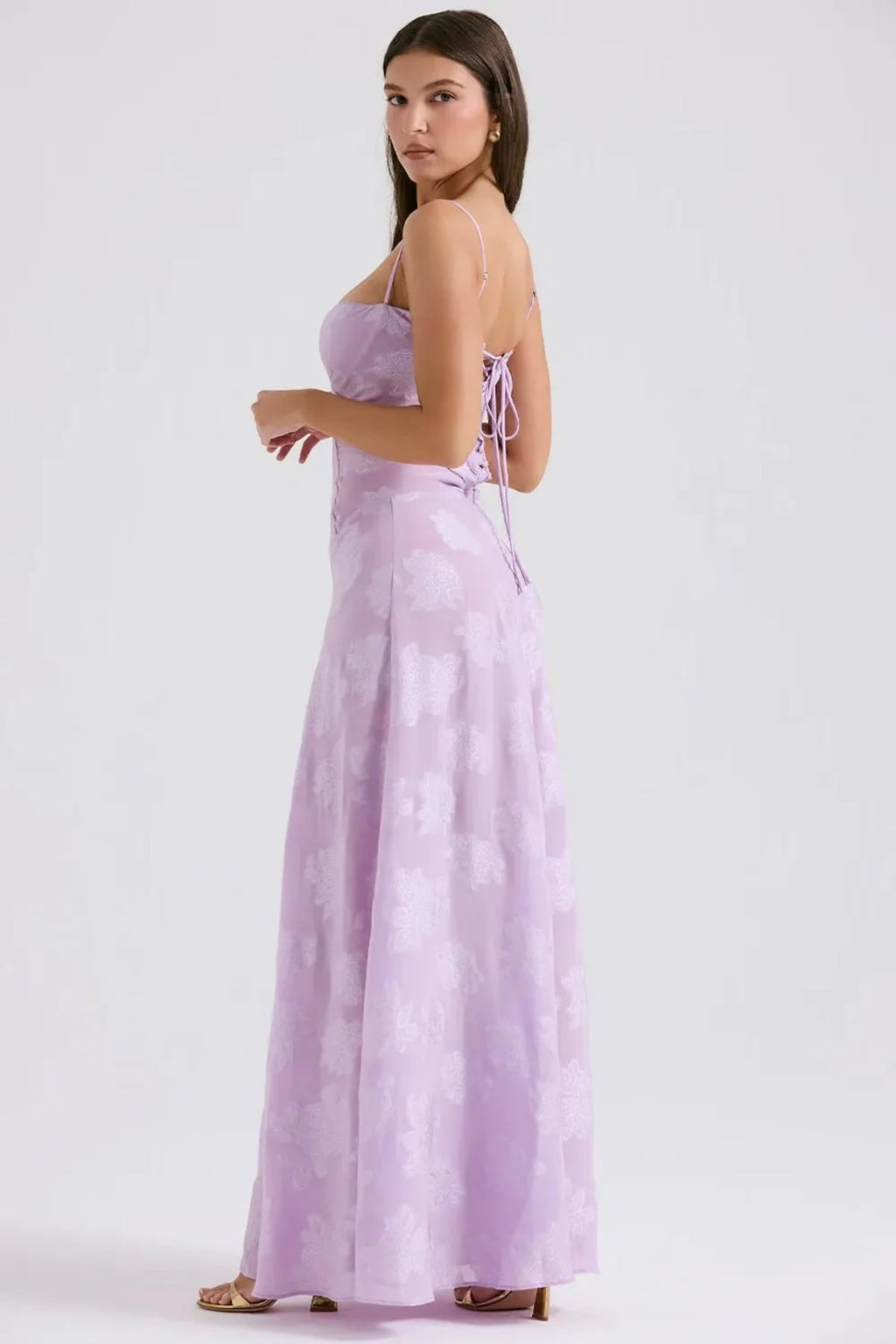 Long summer dress with open back and adjustable straps.