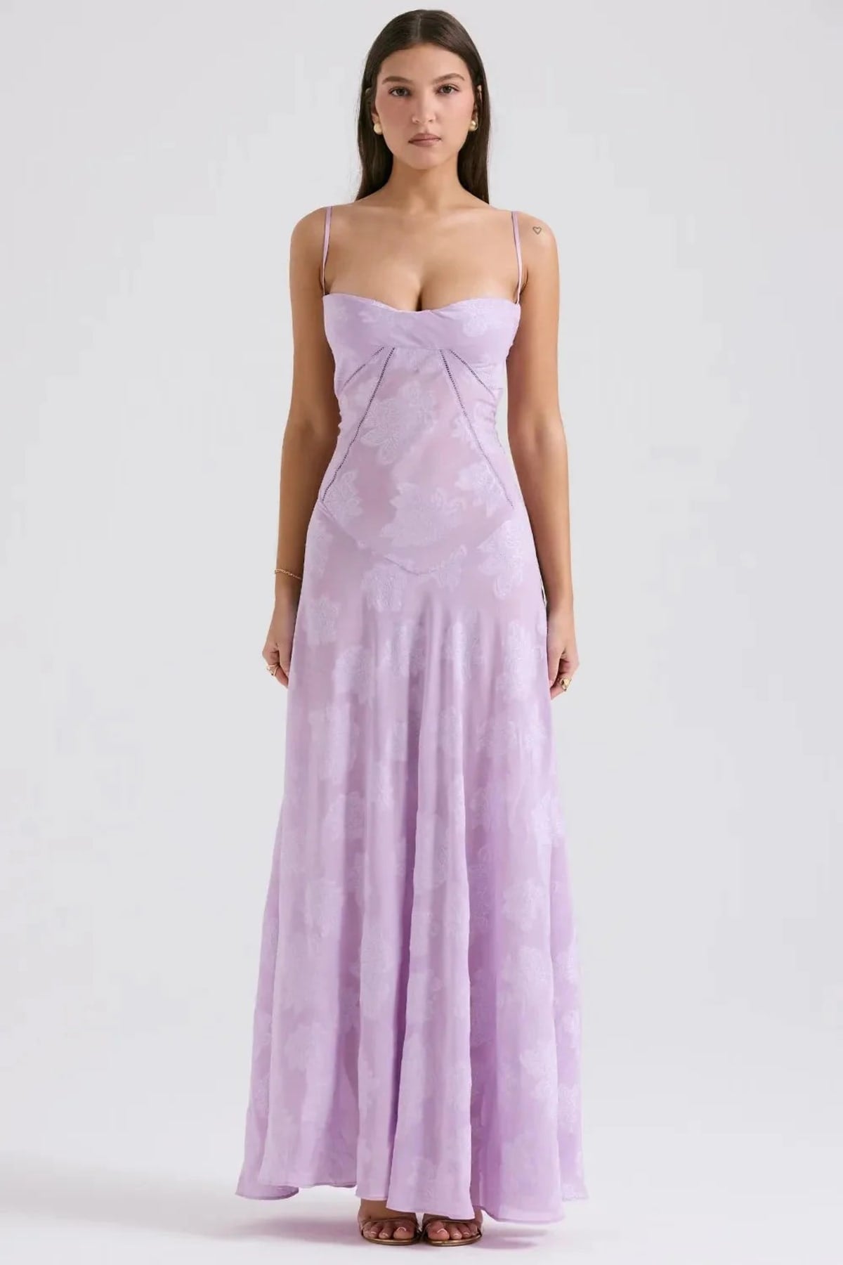 Long summer dress with open back and adjustable straps.