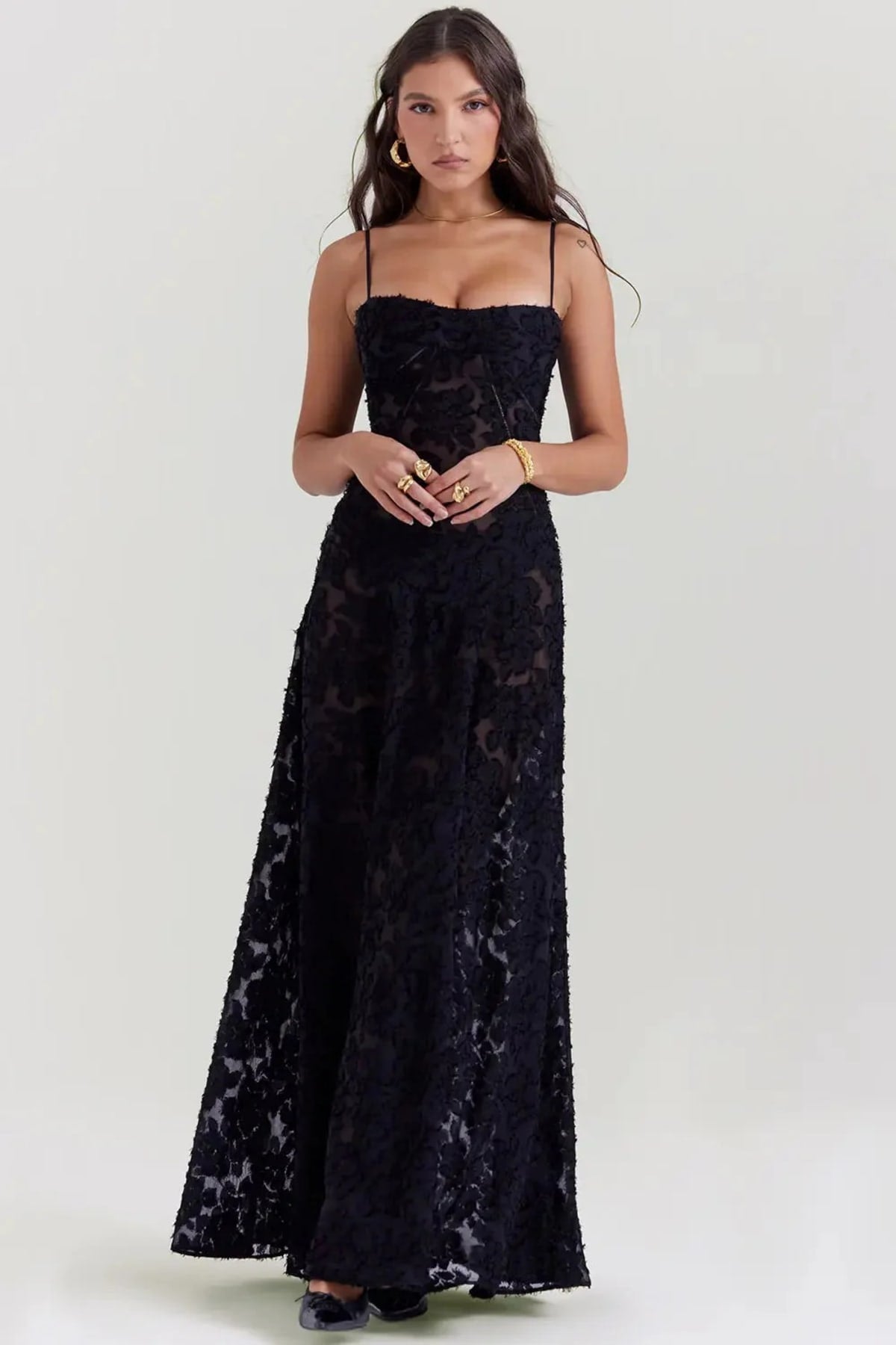 Long summer dress with open back and adjustable straps.