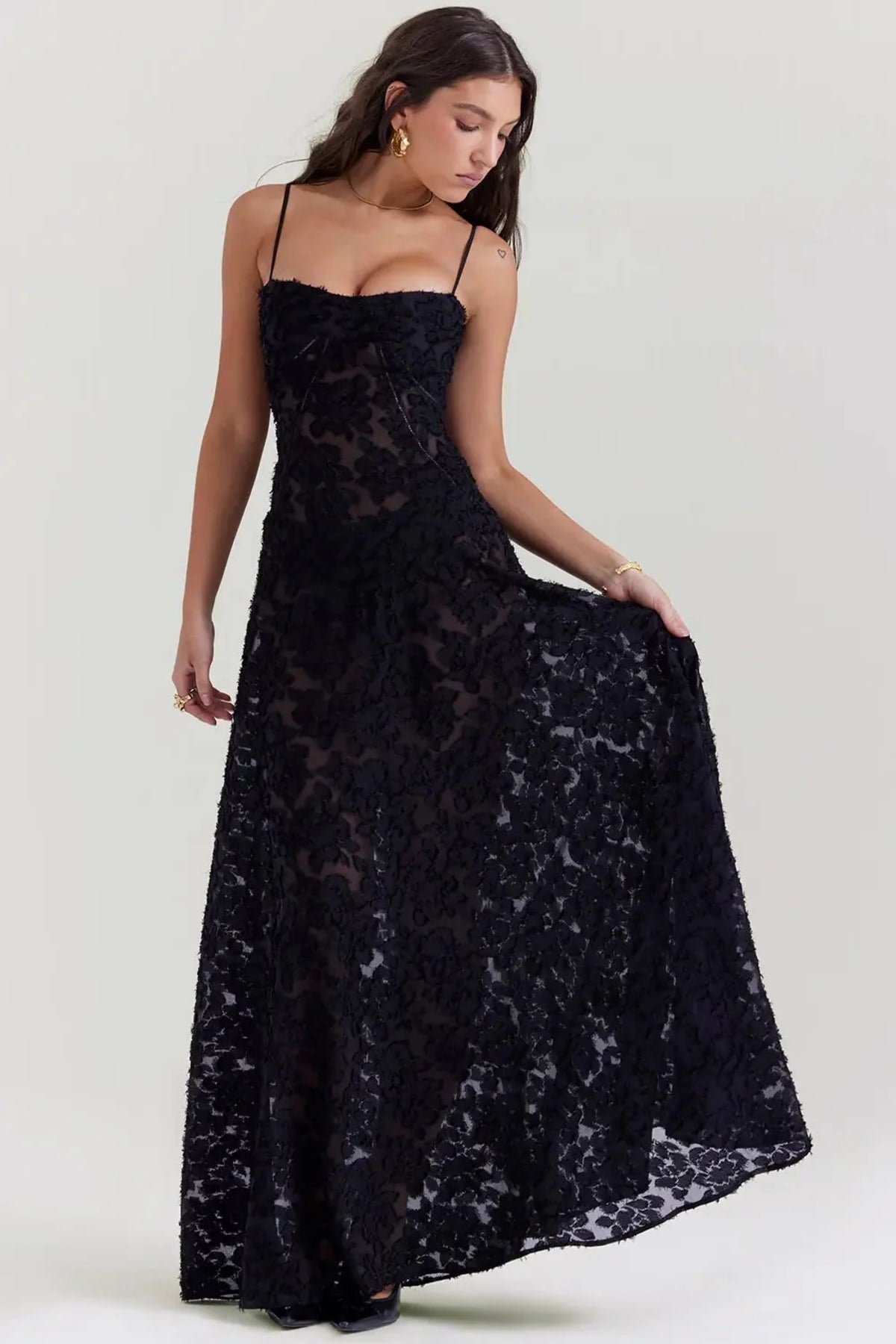 Long summer dress with open back and adjustable straps.