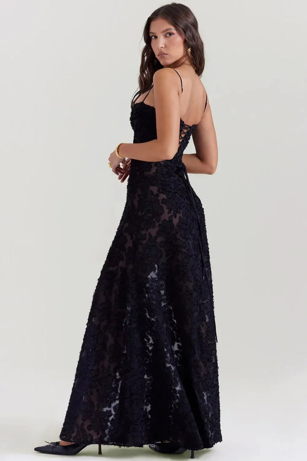 Long summer dress with open back and adjustable straps.