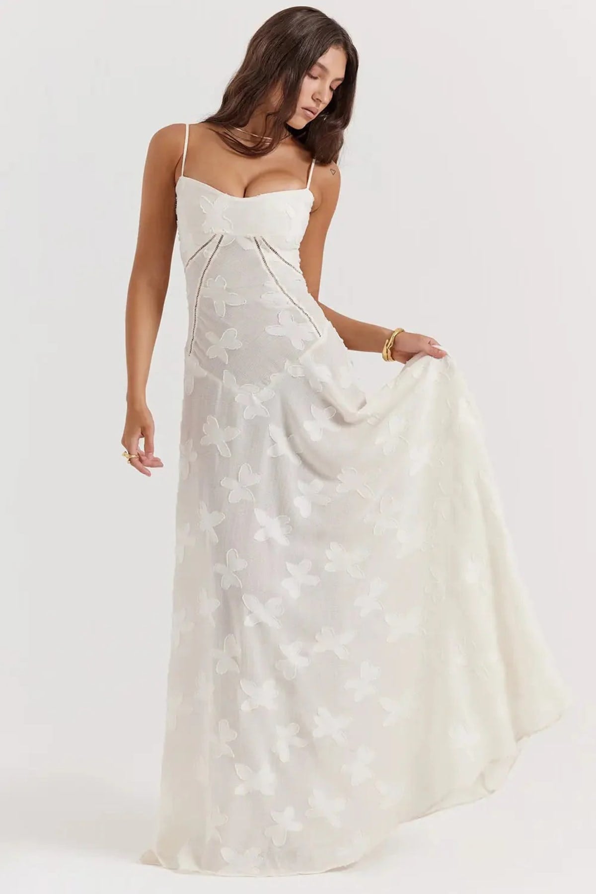 Long summer dress with open back and adjustable straps.