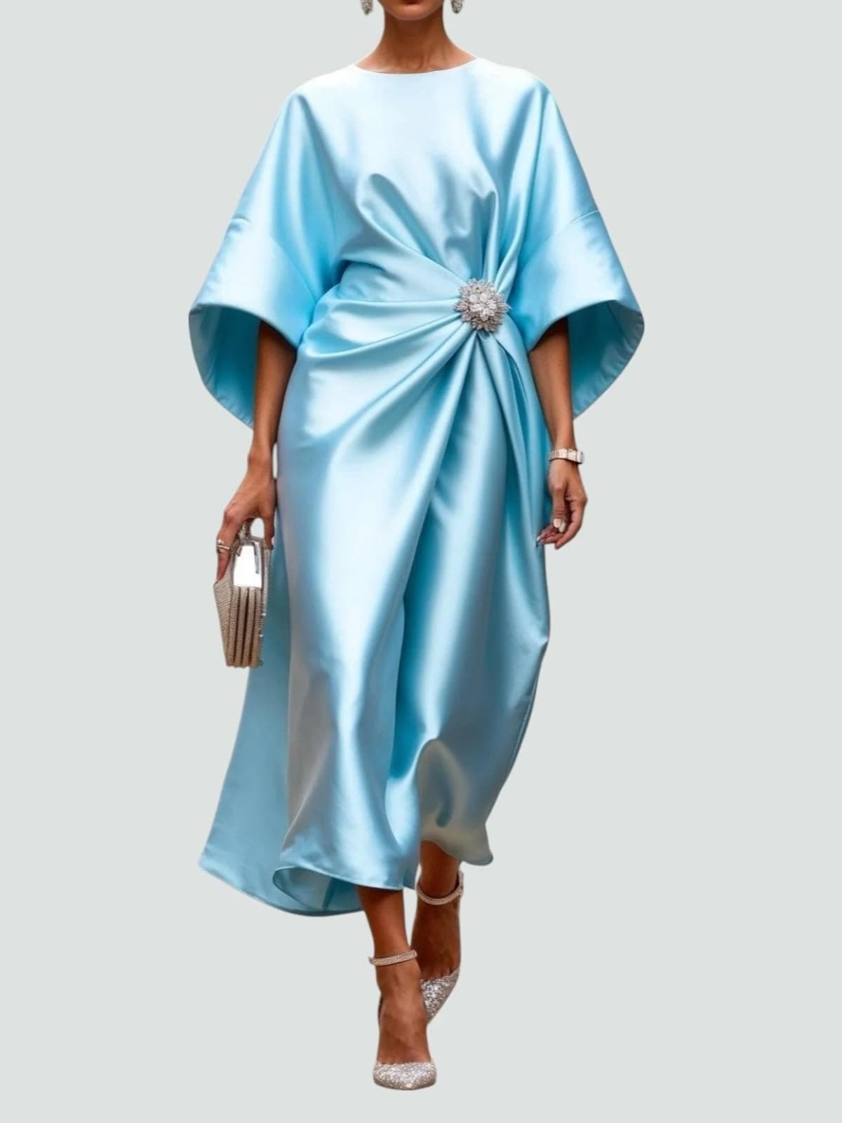 Long elegant dress with refined sheen, flattering silhouette.