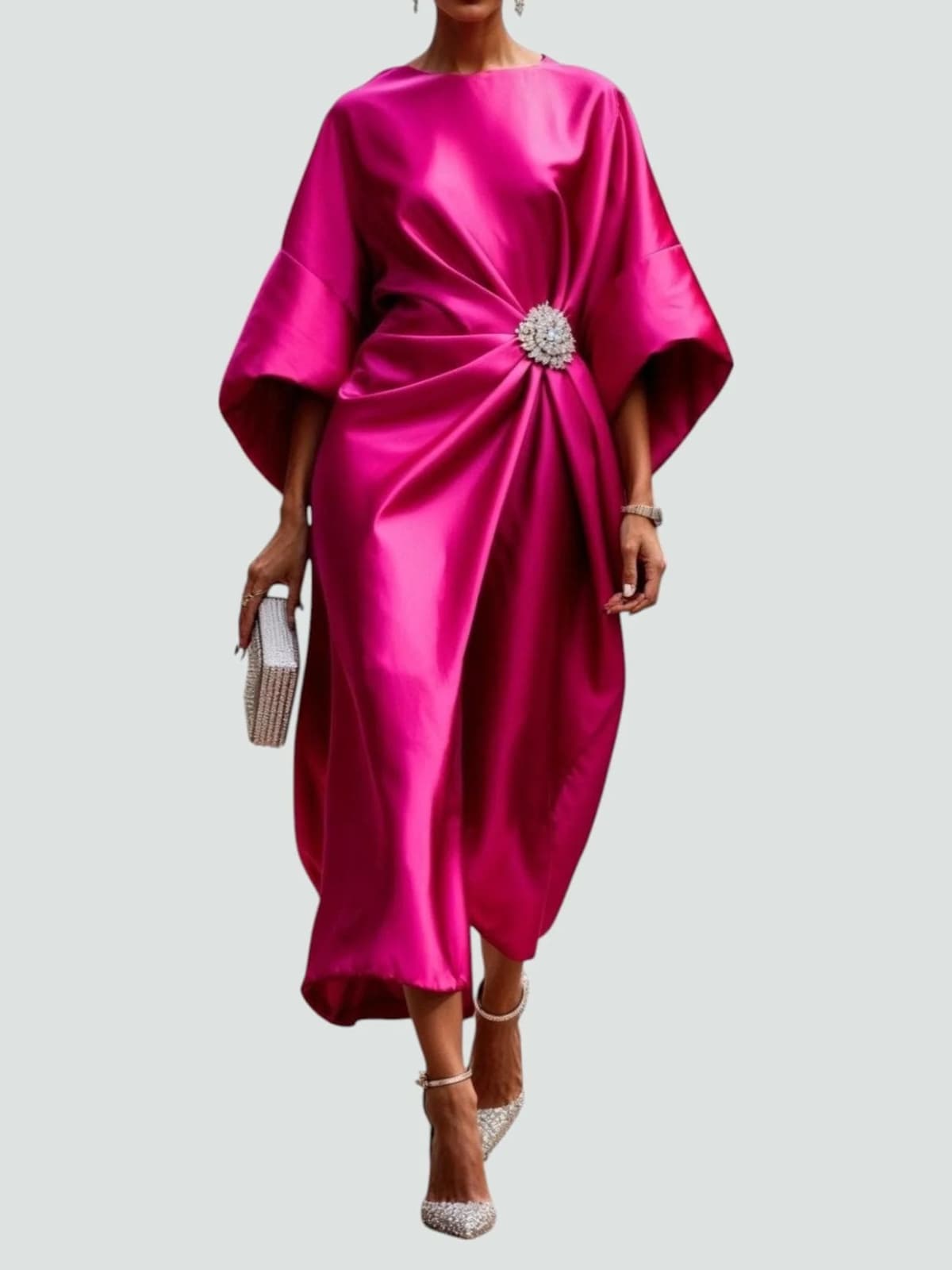 Long elegant dress with refined sheen, flattering silhouette.