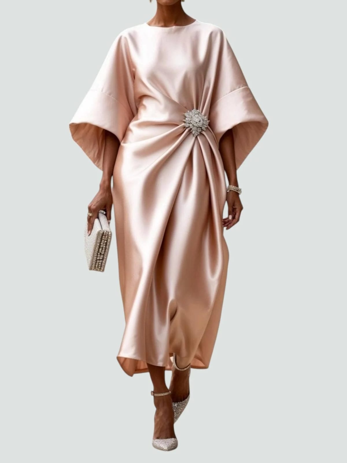 Long elegant dress with refined sheen, flattering silhouette.