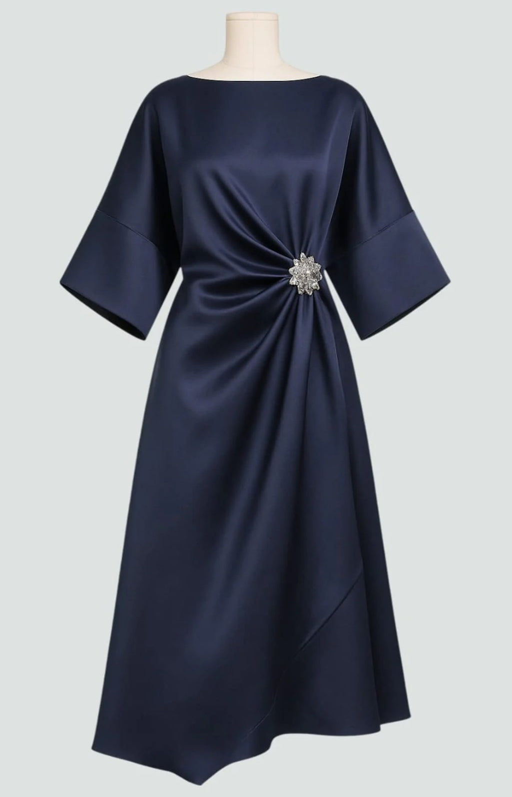 Long elegant dress with refined sheen, flattering silhouette.
