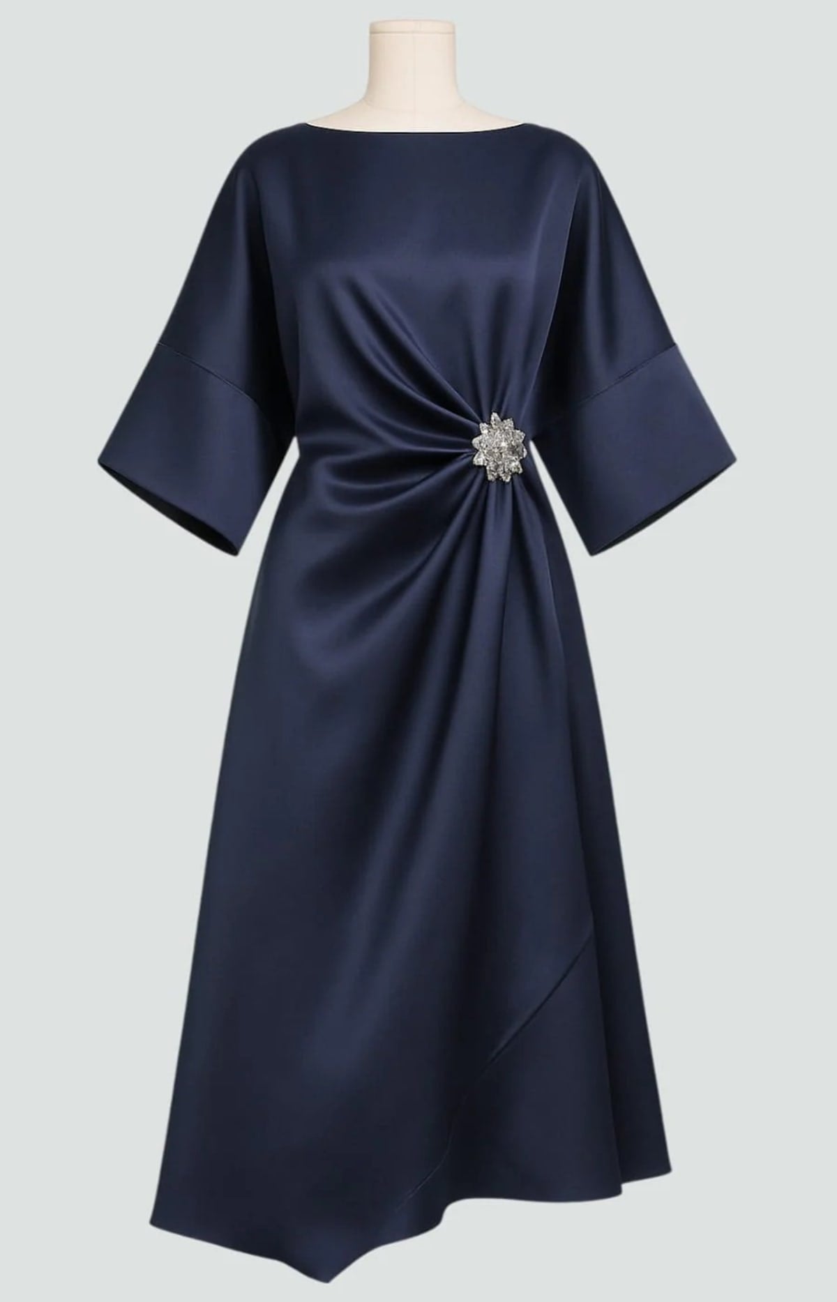 Long elegant dress with refined sheen, flattering silhouette.