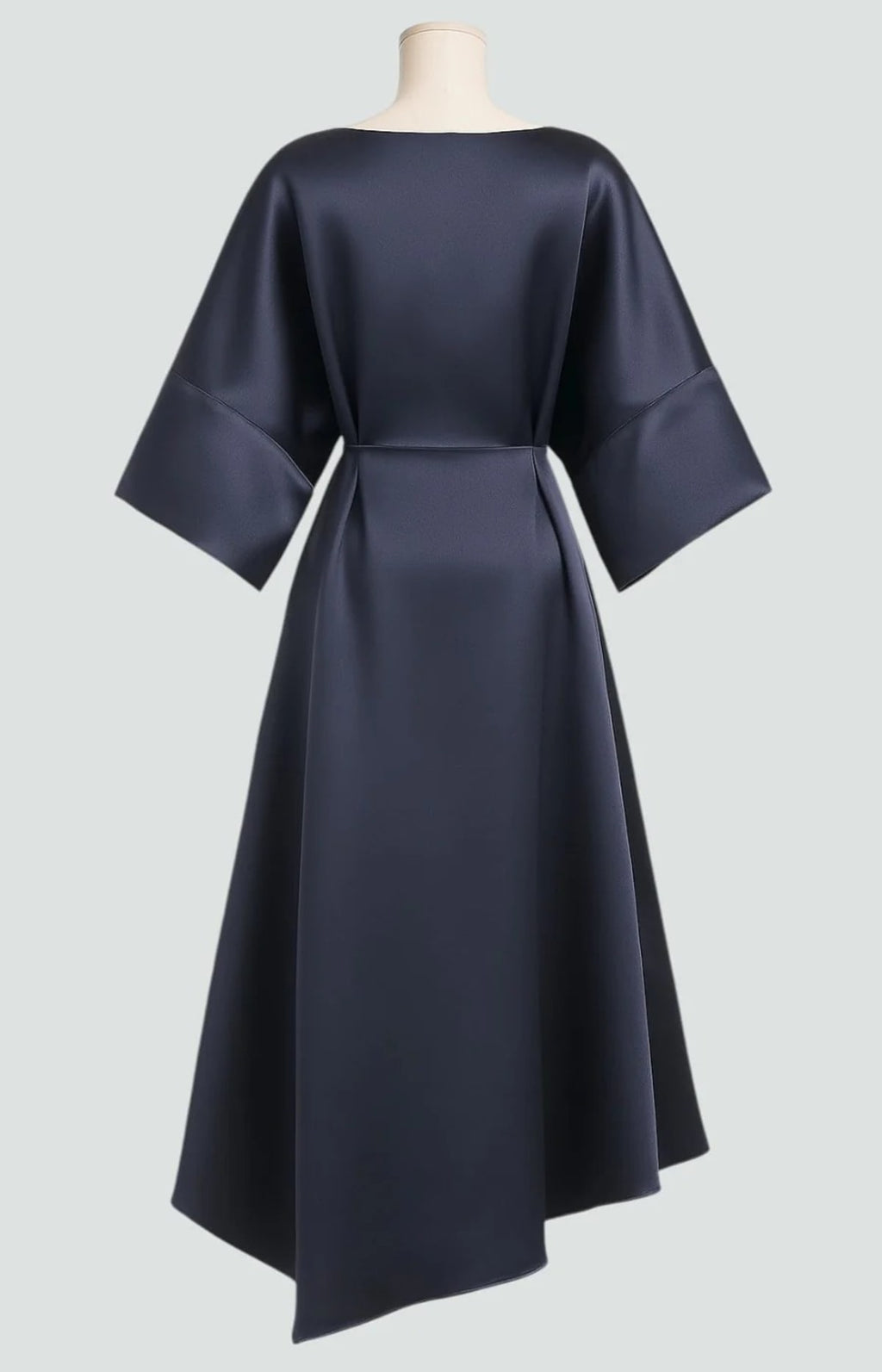 Long elegant dress with refined sheen, flattering silhouette.