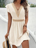 Dress with sweetheart neckline and flowing fit, perfect for summer.