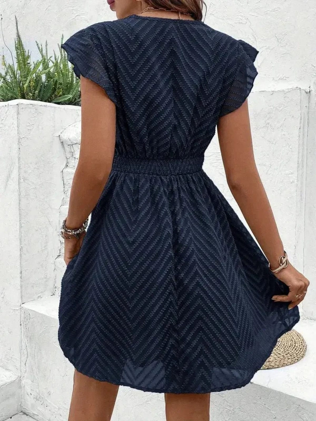 Dress with sweetheart neckline and flowing fit, perfect for summer.