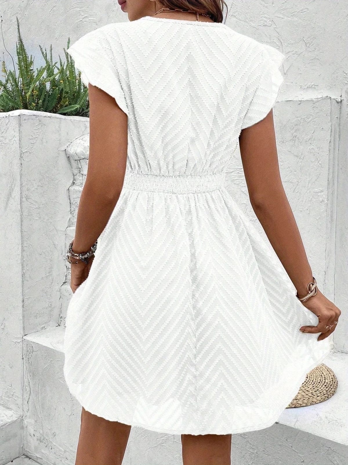 Dress with sweetheart neckline and flowing fit, perfect for summer.