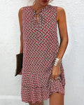 A midi dress with soft drape and gentle shaping, shown on model.