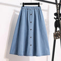Light blue A-line midi skirt with button-front and elastic waist on hanger.