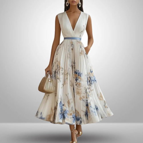 Flowy sleeveless maxi dress with V-neck and soft drape.