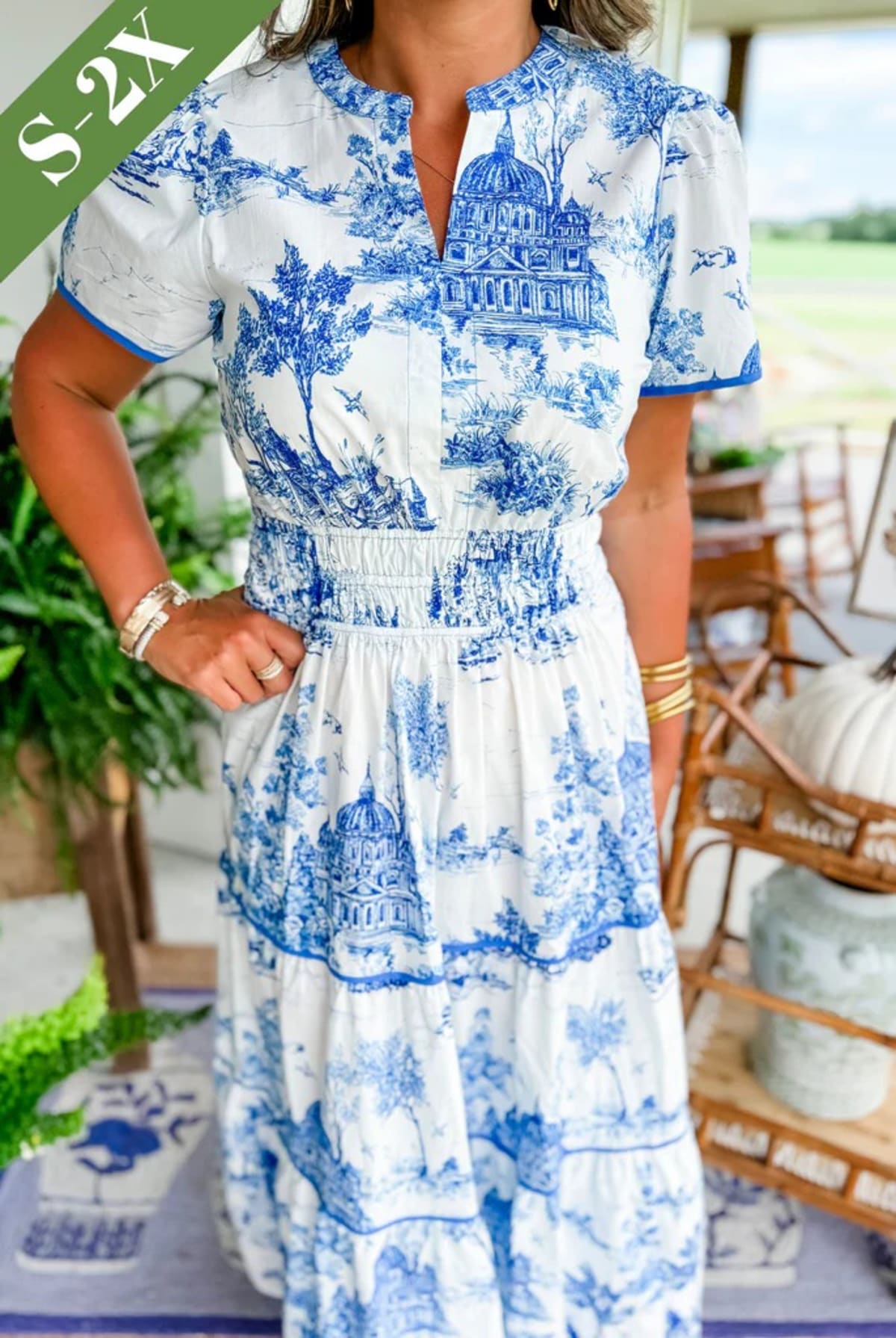 Maxi dress with smocked waist and tiered skirt.