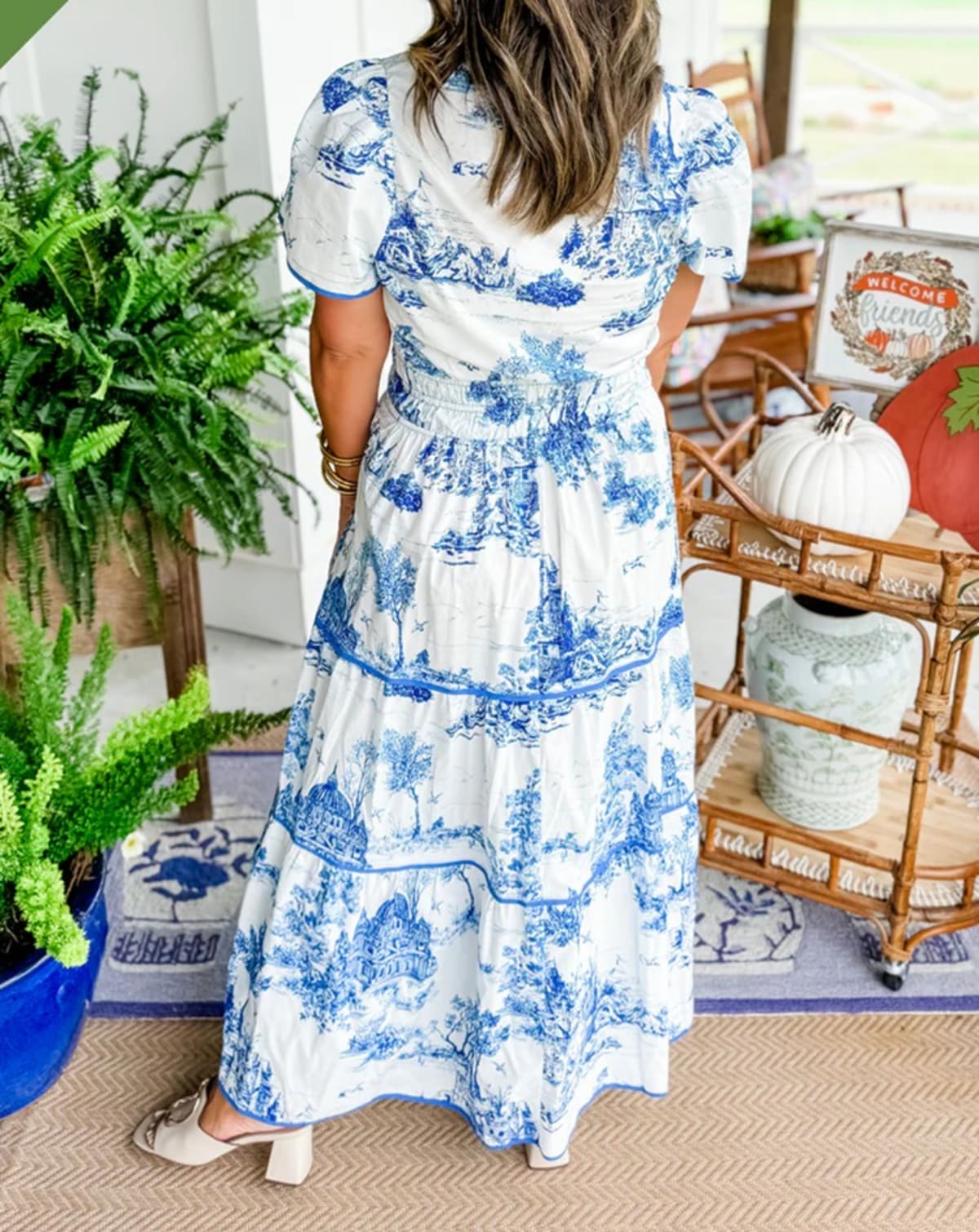 Maxi dress with smocked waist and tiered skirt.